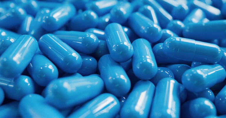 Close up of blue antibiotic capsules